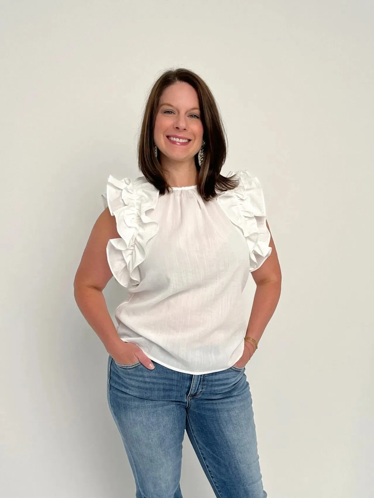 White Sleeveless Ruffle Top