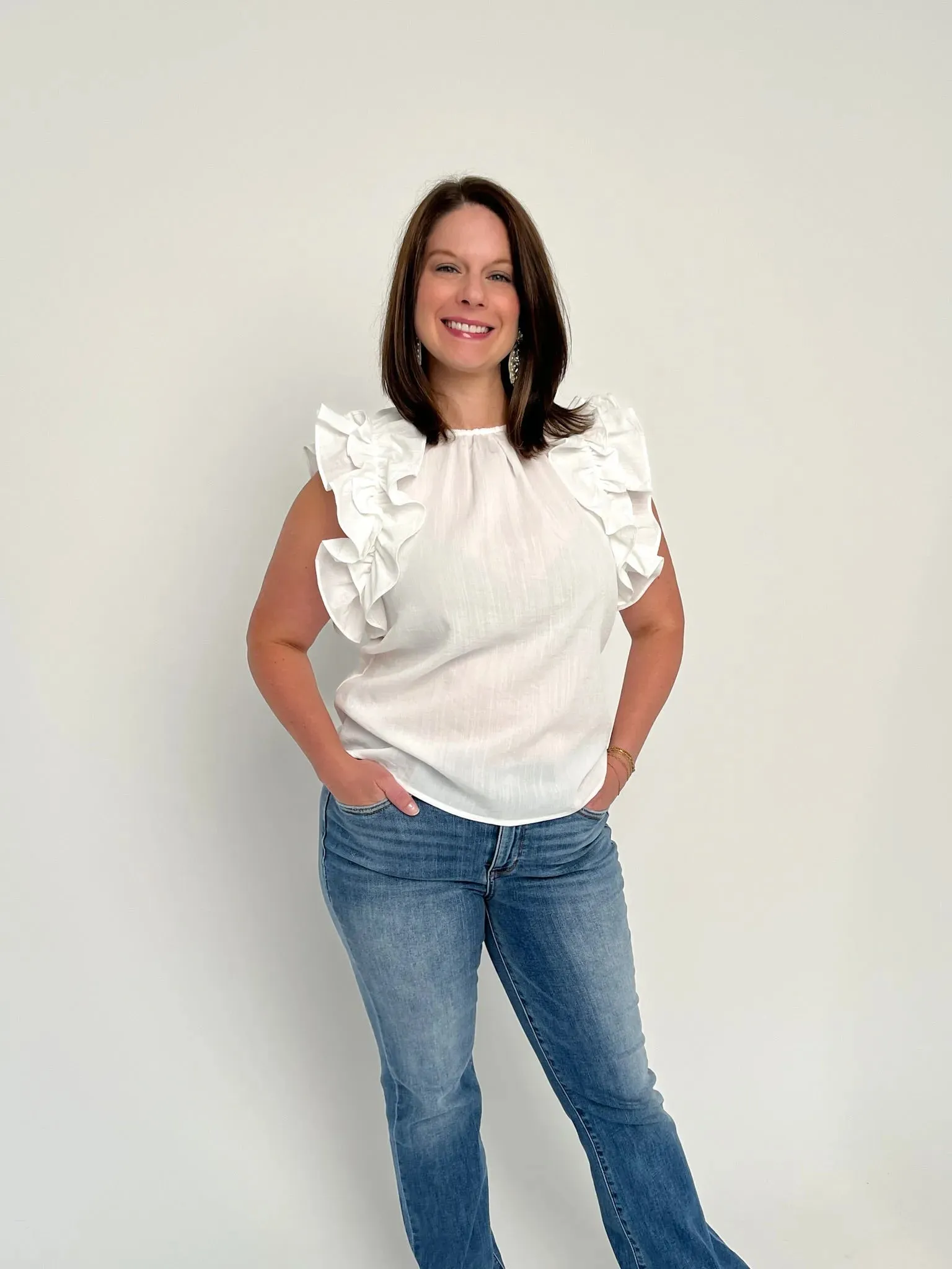 White Sleeveless Ruffle Top