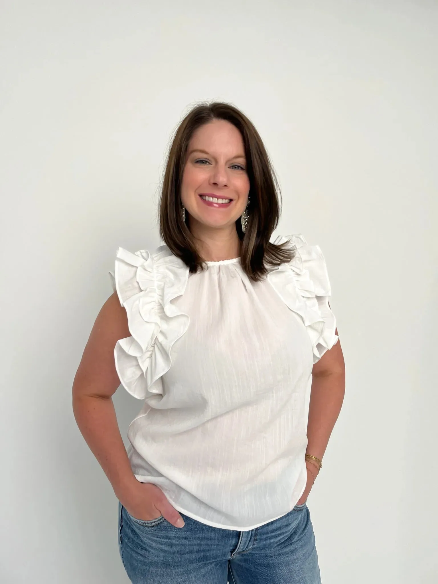 White Sleeveless Ruffle Top